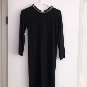 Black knit Zara dress with gold detail around neck
